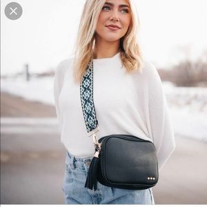 Black cross body purse with printed strap